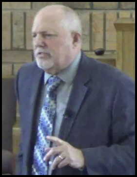 A person standing in front of a podium
AI-generated content may be incorrect.