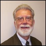 A person with a white beard and glasses

AI-generated content may be incorrect.