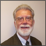 A person with a white beard and glasses

AI-generated content may be incorrect.